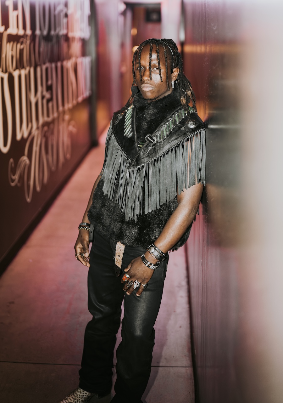 Maurice in fringe jacket, backstage